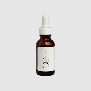 Braune Glasflasche mit weißer Pipette und vertikalem CC Consulting GmbH Logo auf weißem Etikett, vor grauem Hintergrund.